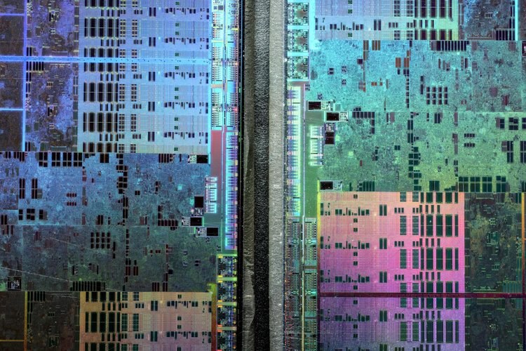 Abstract microscopic photography of a Graphics Processing Unit in rainbow colors